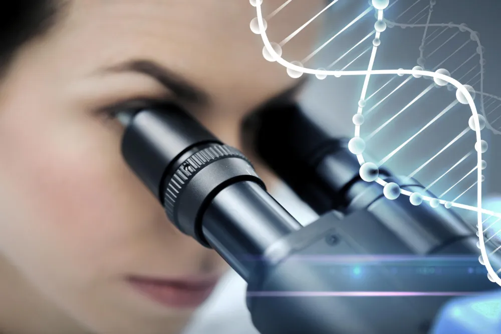 A female scientist looking to microscope eyepiece doing anti-aging research in clinical laboratory with DNA molecule structure.