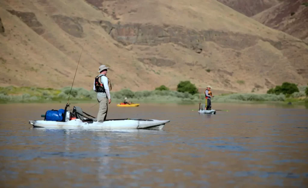 Fishing out of kayaks in Oregon in the John Day River.